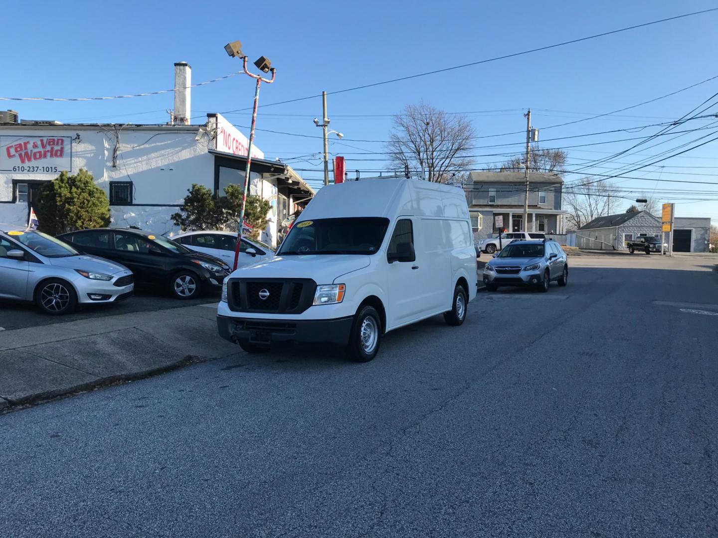 2015 White Nissan NV Cargo S (1N6BF0LX6FN) with an 4.0 V6 engine, Automatic transmission, located at 577 Chester Pike, Prospect Park, PA, 19076, (610) 237-1015, 39.886154, -75.302338 - Photo#1